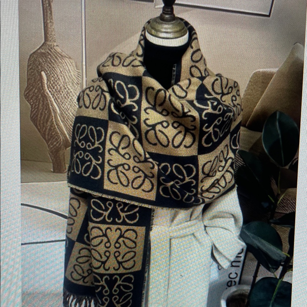 Elegant Black and Tan Patterned Scarf